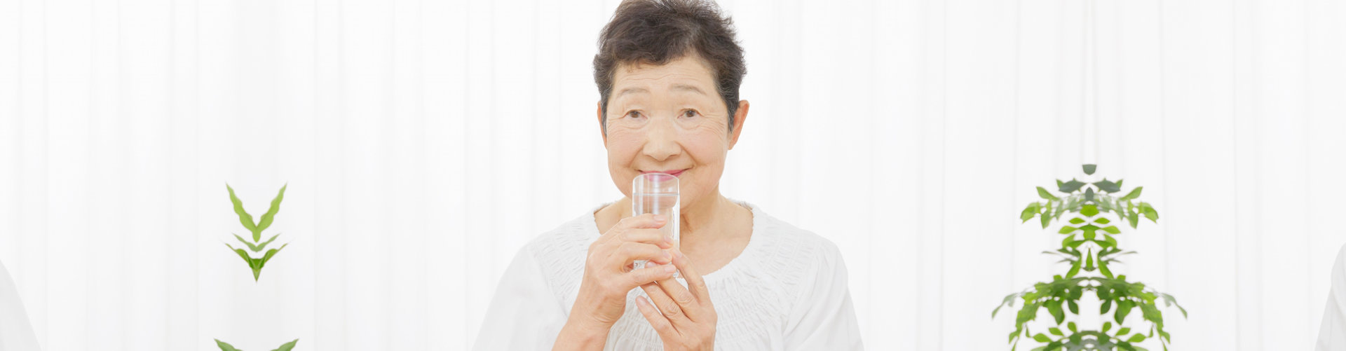 old woman drinking water